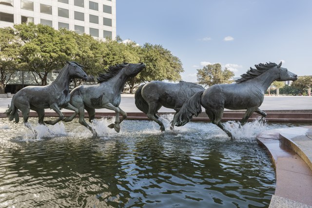 lossy-page1-640px-View_of_the_%22Mustangs_of_Las_Colinas%22_sculpture_in_the_upscale_Las_Colinas_neighborhood_of_Irving%2C_Texas_LCCN2015630704.tif.jpg